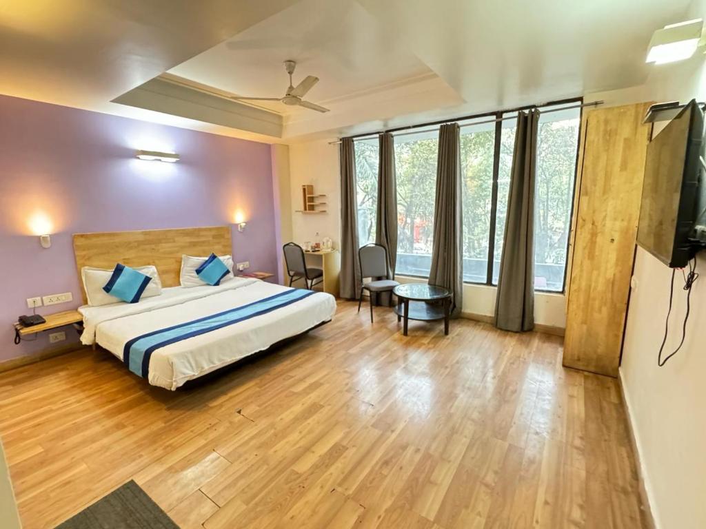 Lova arba lovos apgyvendinimo įstaigoje Hotel The Centrum - NFC New Delhi