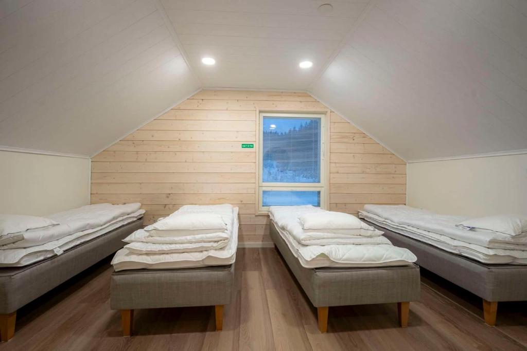 Postel nebo postele na pokoji v ubytování Tähtitaivas