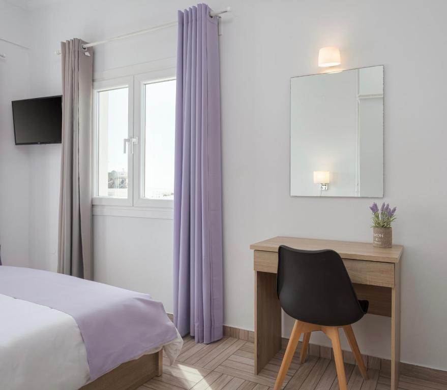 Postel nebo postele na pokoji v ubytování Venus Minimal Hotel