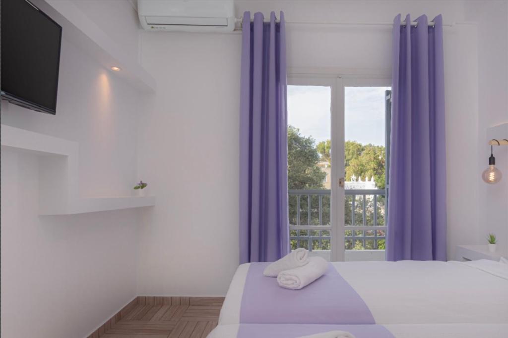 Postel nebo postele na pokoji v ubytování Venus Minimal Hotel