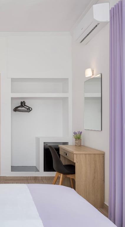 Postel nebo postele na pokoji v ubytování Venus Minimal Hotel