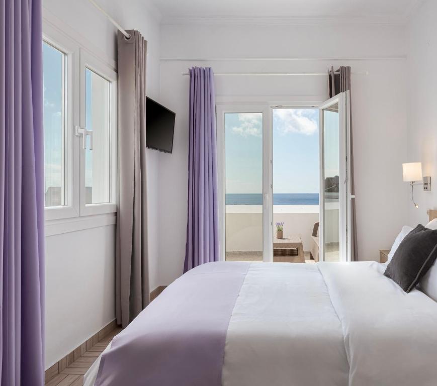 Postel nebo postele na pokoji v ubytování Venus Minimal Hotel