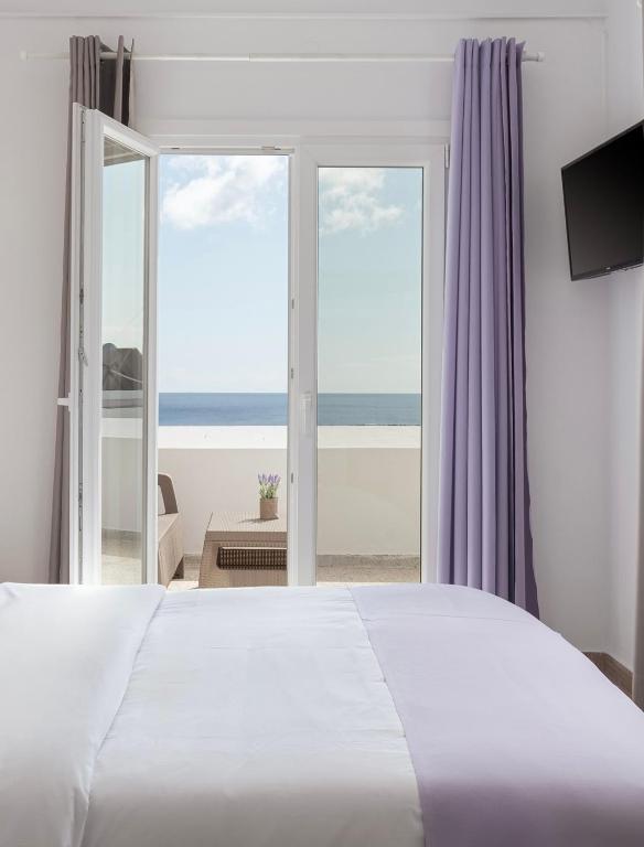 Postel nebo postele na pokoji v ubytování Venus Minimal Hotel