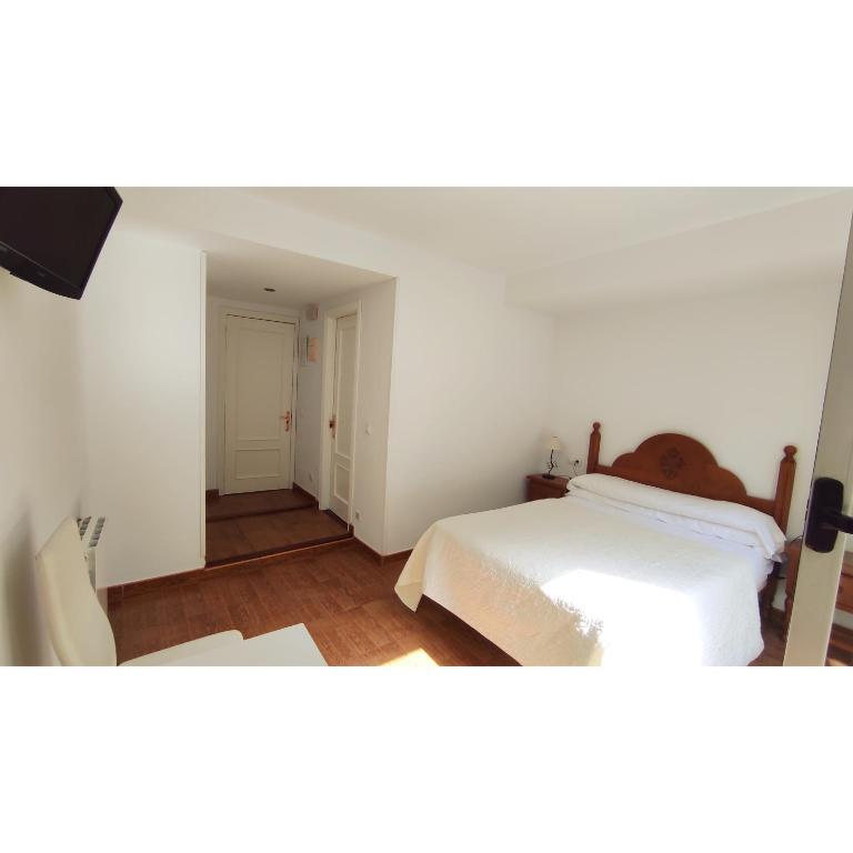 Postel nebo postele na pokoji v ubytování Pension Villa **