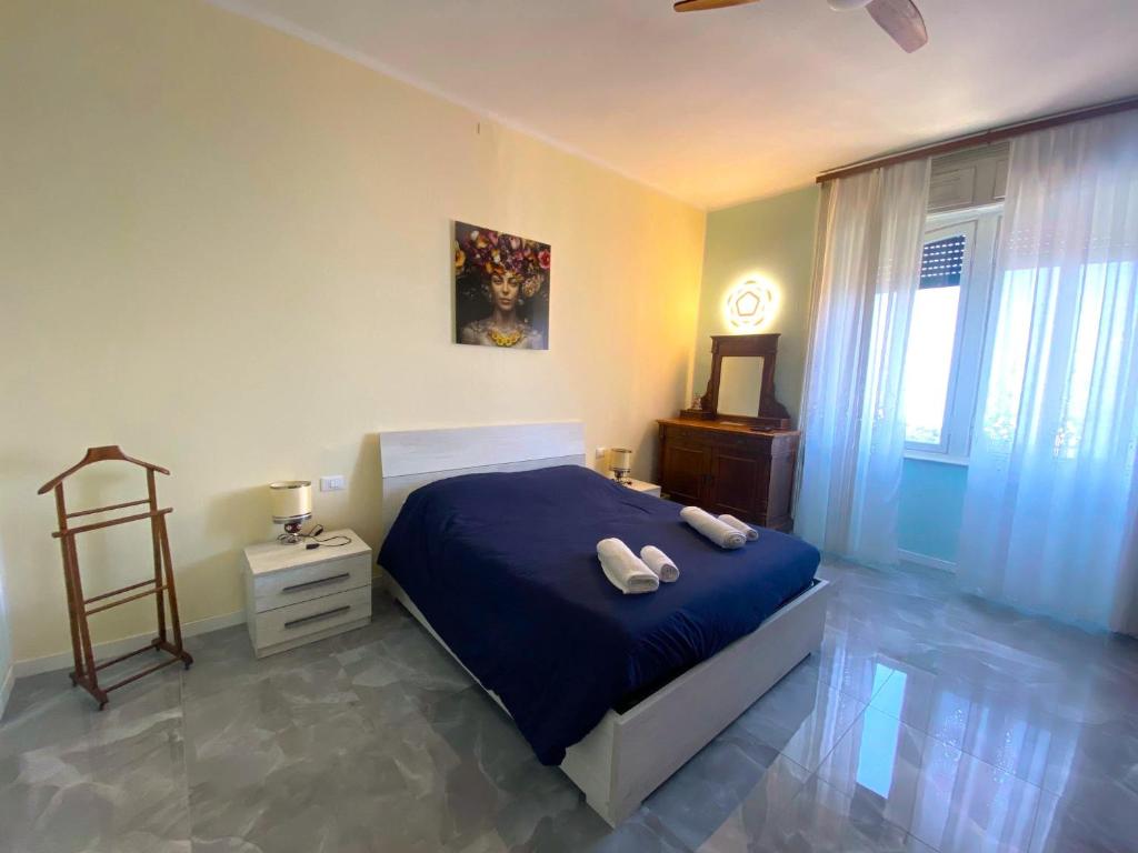 Postel nebo postele na pokoji v ubytování Villa Silvana