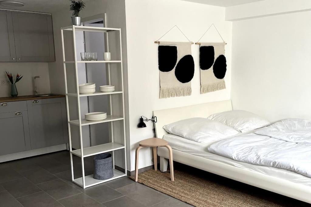 Postel nebo postele na pokoji v ubytování 1-Zimmer-Apartment am Bodensee