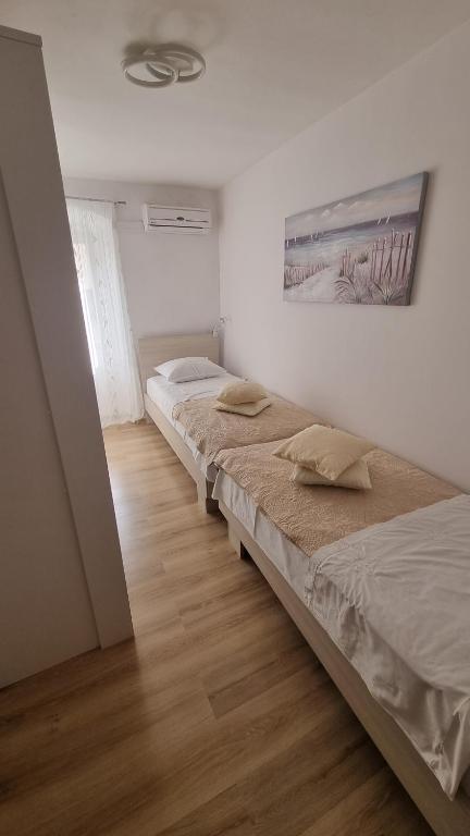 Posteľ alebo postele v izbe v ubytovaní Apartment Vestibul Inn