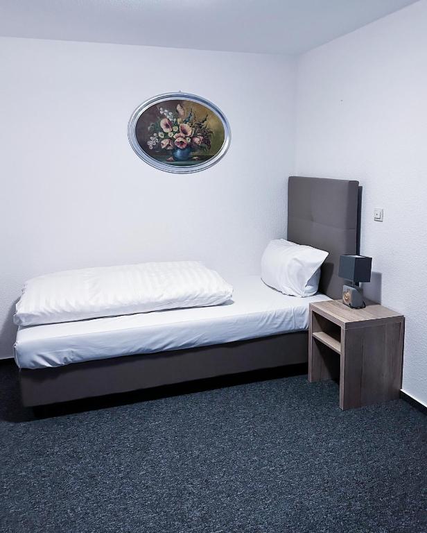 Postel nebo postele na pokoji v ubytování Hotel & Restaurant Schaumburger Ritter, Rinteln