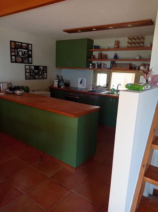Kuchyň nebo kuchyňský kout v ubytování Askalosia villa