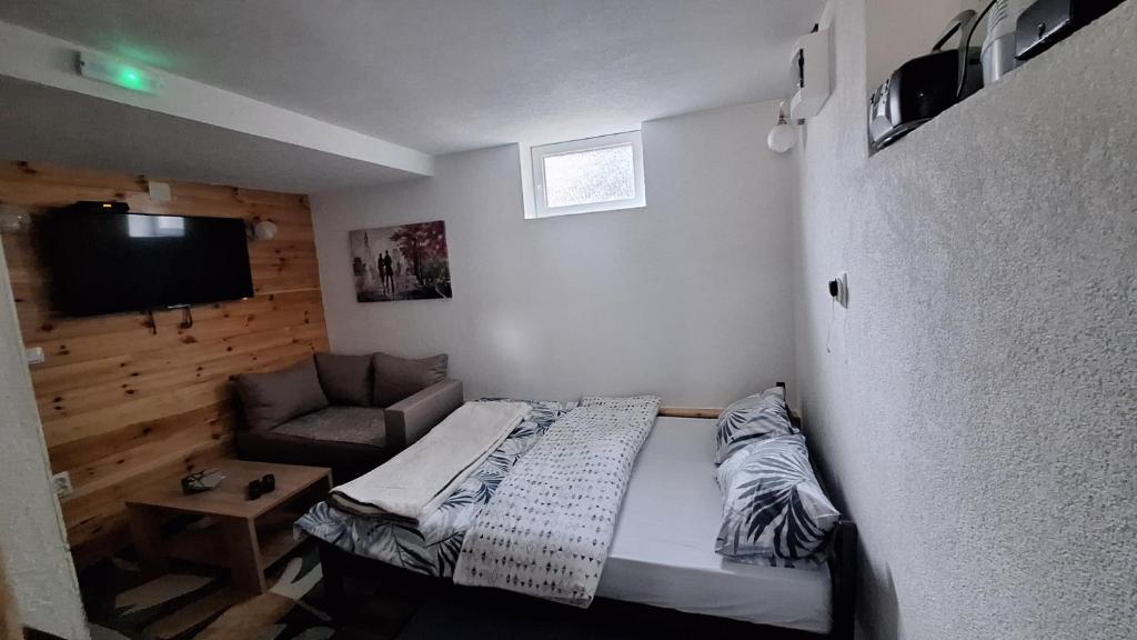 TV a/nebo společenská místnost v ubytování Apartman A&J 2