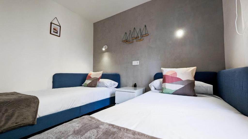 Postel nebo postele na pokoji v ubytování CARABELAS Levante beach apartment