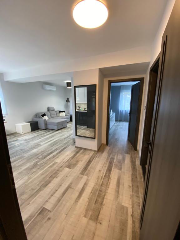 A bed or beds in a room at Janka11 Apartman