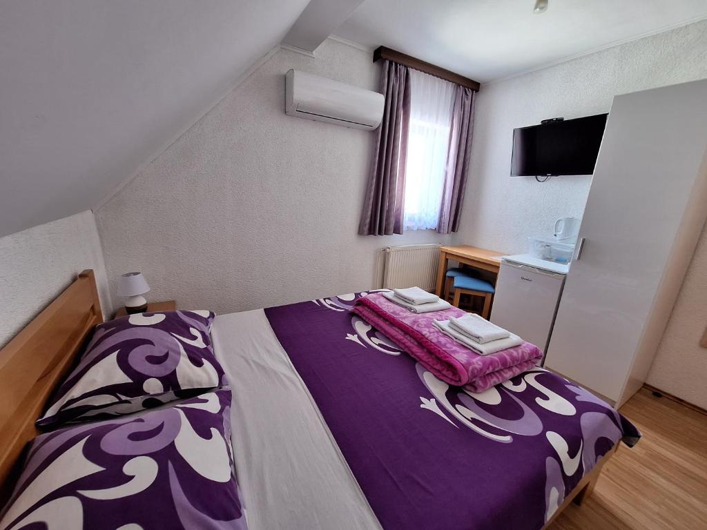 Posteľ alebo postele v izbe v ubytovaní Guest House Matej & Mateja