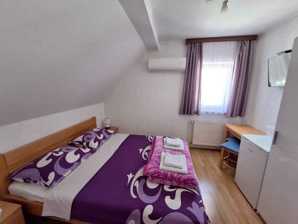 Posteľ alebo postele v izbe v ubytovaní Guest House Matej & Mateja