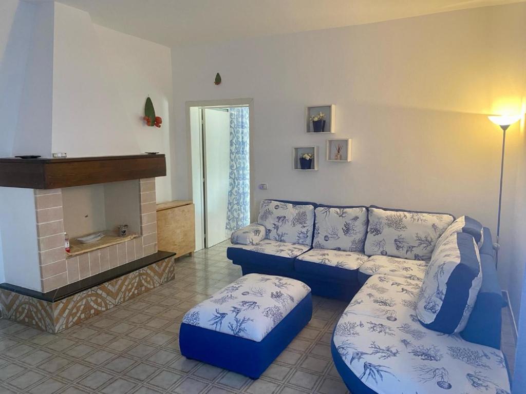 Posezení v ubytování Dora e Franco Apartment treseiseiseiquattroseicinquezeroottozero