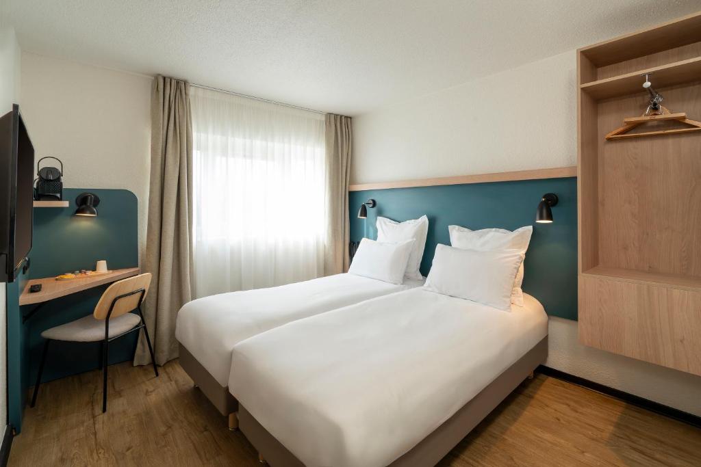 Postel nebo postele na pokoji v ubytování Le Carline, Sure Hotel Collection by Best Western