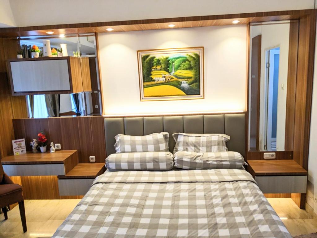 Vuode tai vuoteita majoituspaikassa The cozy & luxury room in Podomoro City Deli Medan
