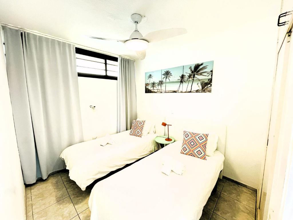 Postel nebo postele na pokoji v ubytování Seaview Apartment Los Cactus