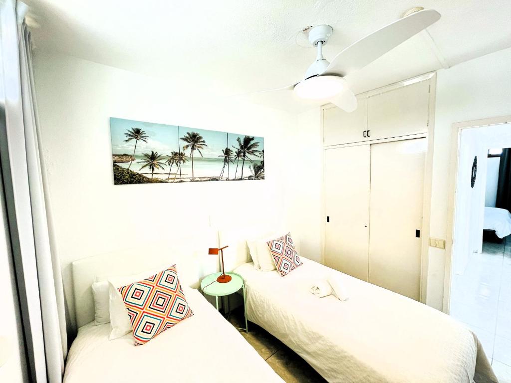 Postel nebo postele na pokoji v ubytování Seaview Apartment Los Cactus