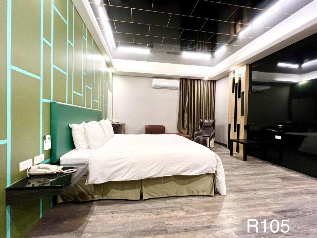 Postel nebo postele na pokoji v ubytování Cigar Motel