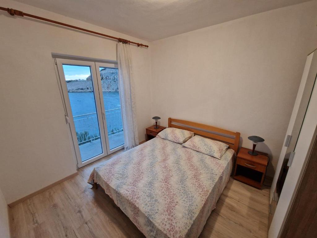 Posteľ alebo postele v izbe v ubytovaní Apartment Lisarica