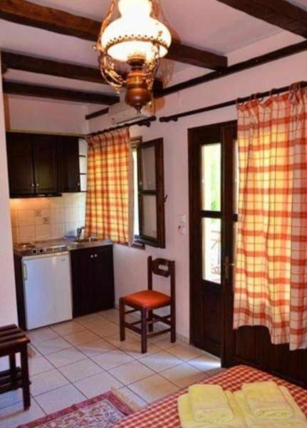 Kuchyň nebo kuchyňský kout v ubytování Hotel Maria