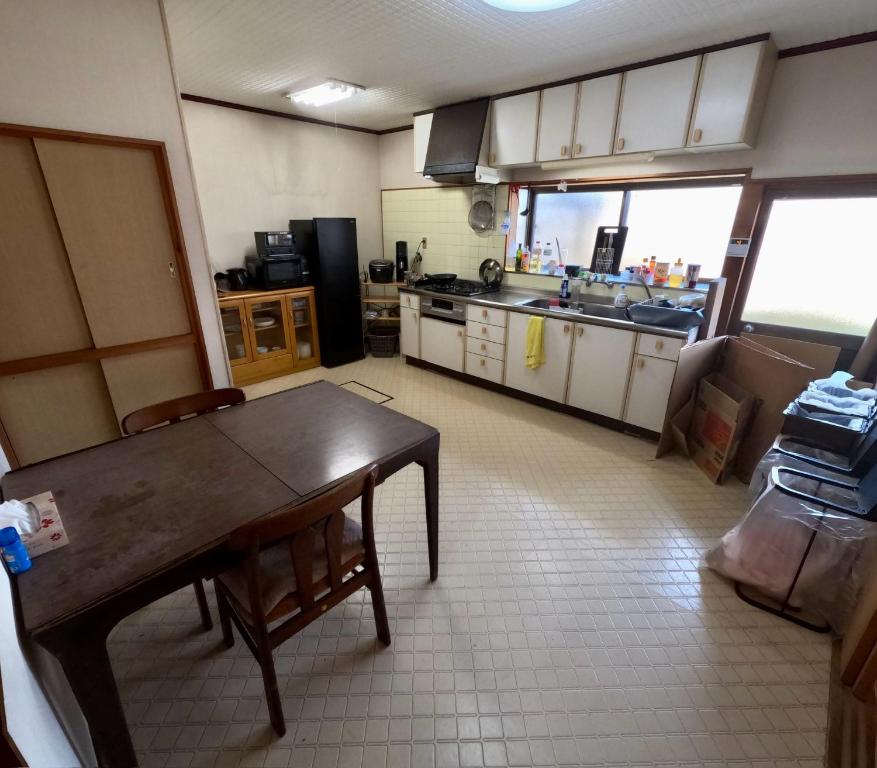 Kuchyň nebo kuchyňský kout v ubytování Guesthouse NAMAZU