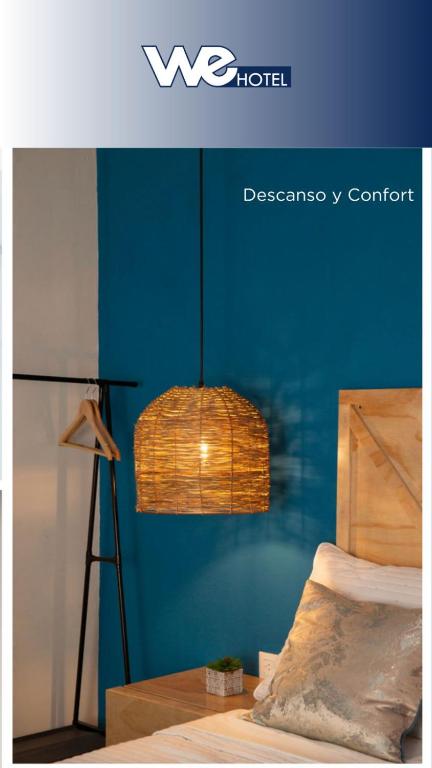 Postel nebo postele na pokoji v ubytování WE Hotel, La Lima