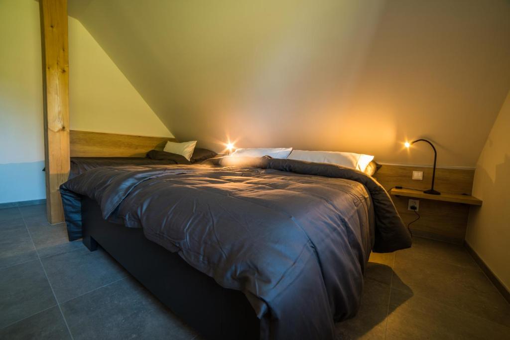 Postel nebo postele na pokoji v ubytování APARTMÁNY ATHEL KVILDA