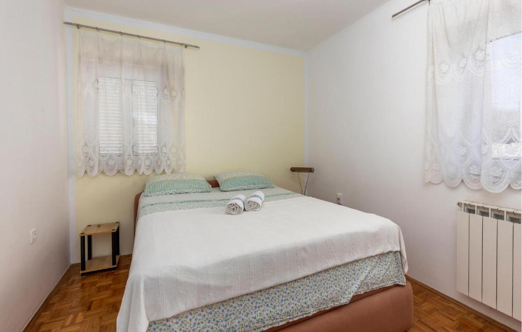 Posteľ alebo postele v izbe v ubytovaní Nice Apartment In Rijeka