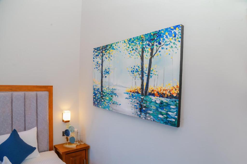 Postel nebo postele na pokoji v ubytování Golden Shower Inn