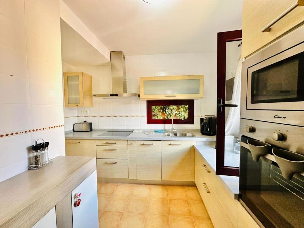 Kuchyň nebo kuchyňský kout v ubytování MAISON SAJARELLE