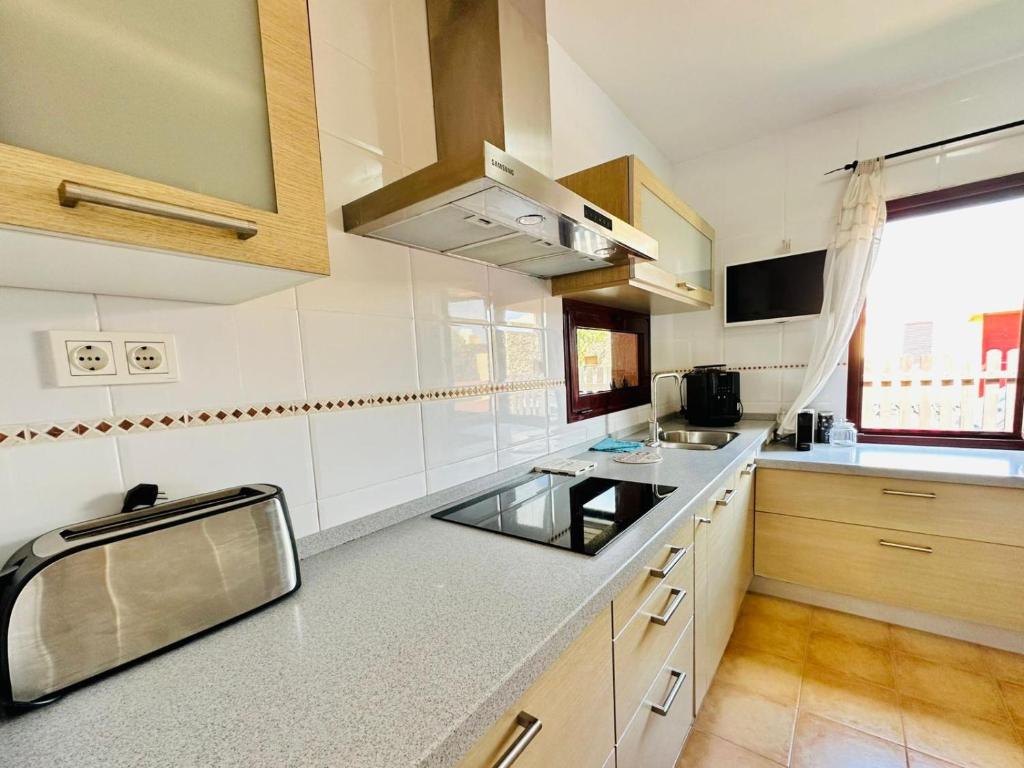 Kuchyň nebo kuchyňský kout v ubytování MAISON SAJARELLE
