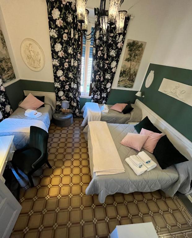 Postel nebo postele na pokoji v ubytování Villa San Donato B&B
