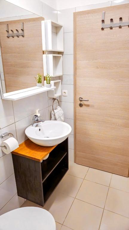 Kúpeľňa v ubytovaní Apartman Murter 2+1