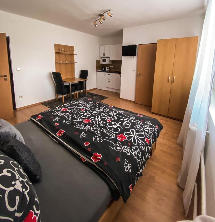 Postel nebo postele na pokoji v ubytování Apartmánový dom Adriana