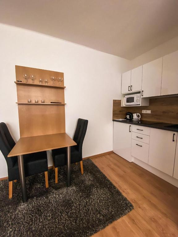 Kuchyň nebo kuchyňský kout v ubytování Apartmánový dom Adriana