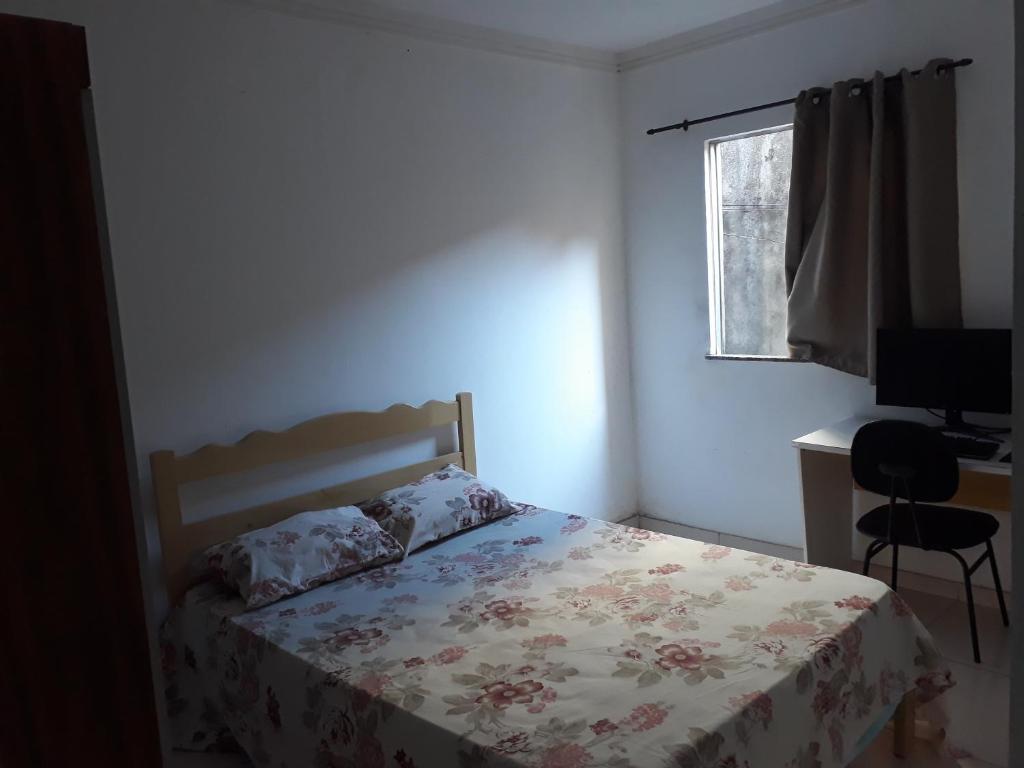 Llit o llits en una habitació de Apartamento temporada - Praia do Sul
