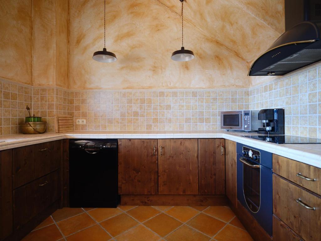 Kuchyň nebo kuchyňský kout v ubytování Casa del Moliner
