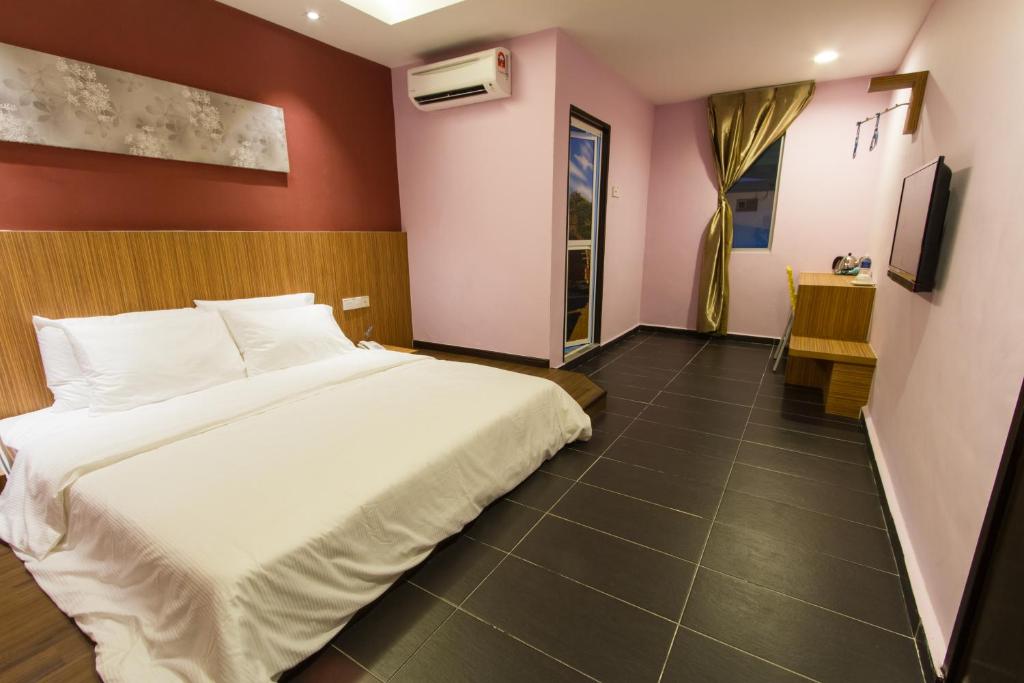 TV a/nebo společenská místnost v ubytování JS Hotel