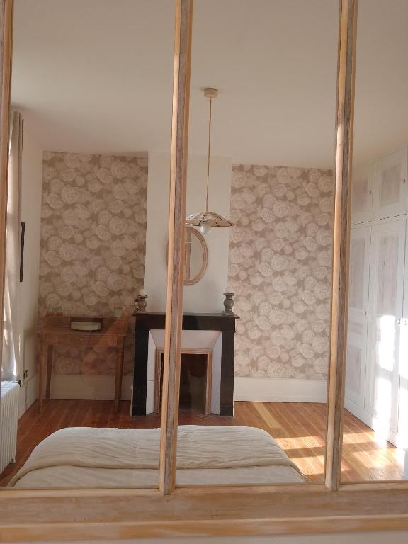 Postel nebo postele na pokoji v ubytování Charme D Antan