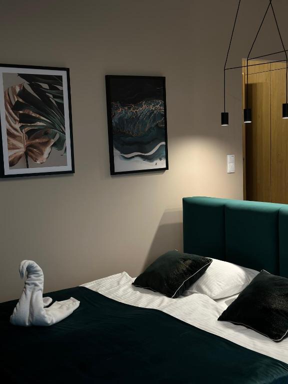 Posteľ alebo postele v izbe v ubytovaní Tauron Arena Apartment with Garage - Kraków Lema