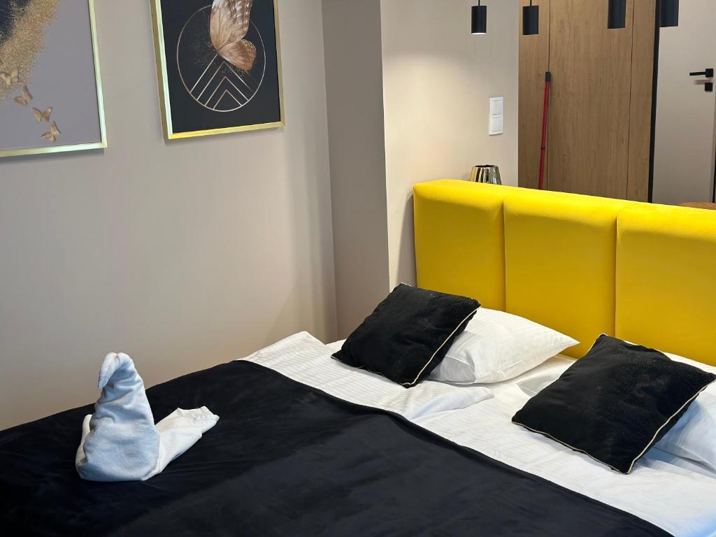 Posteľ alebo postele v izbe v ubytovaní Tauron Arena Apartment with Garage - Kraków Lema