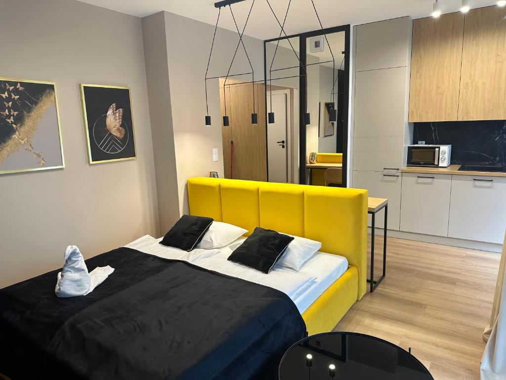 Posteľ alebo postele v izbe v ubytovaní Tauron Arena Apartment with Garage - Kraków Lema
