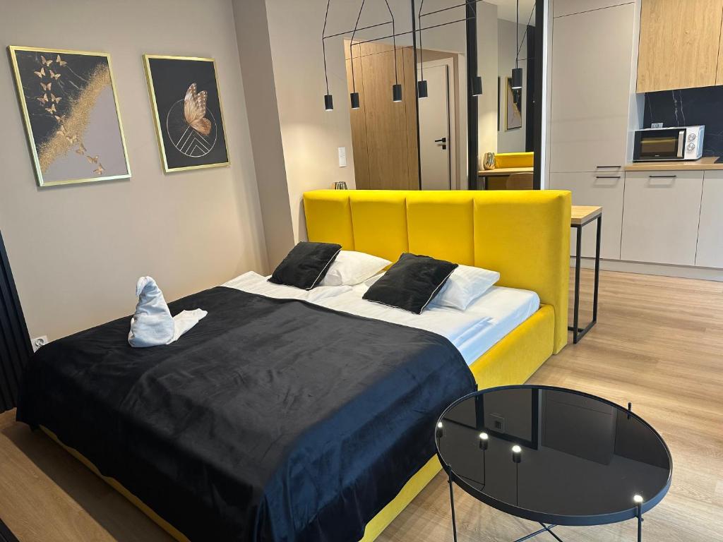 Posteľ alebo postele v izbe v ubytovaní Tauron Arena Apartment with Garage - Kraków Lema