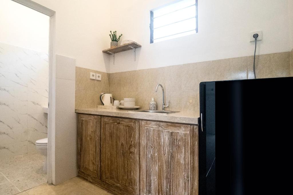 The Cozy Haven Sanur - 12