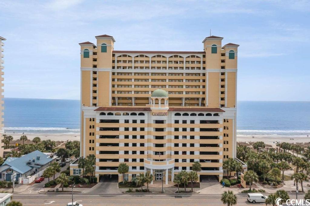 a large building in front of the ocean at Camelot By The Sea - Blue C in Myrtle Beach