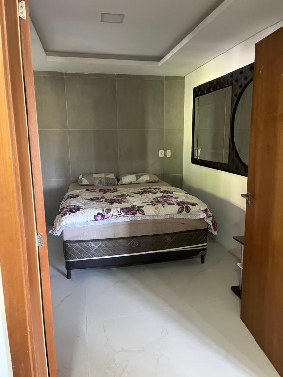 A bed or beds in a room at Estadia Barragem do Salto - Casa Mugam