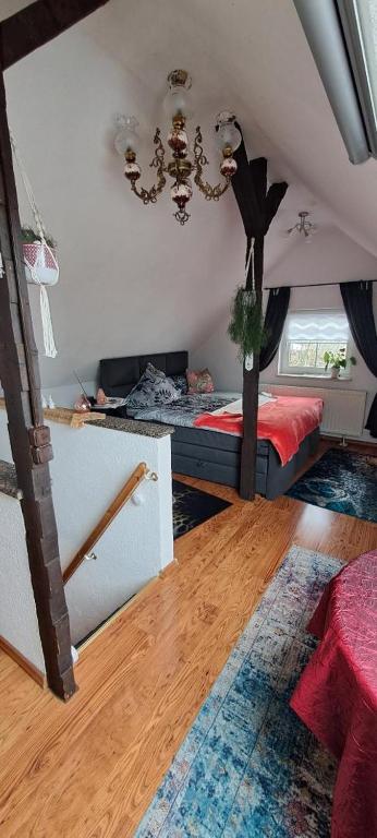 Postel nebo postele na pokoji v ubytování wohnen bei Goethes