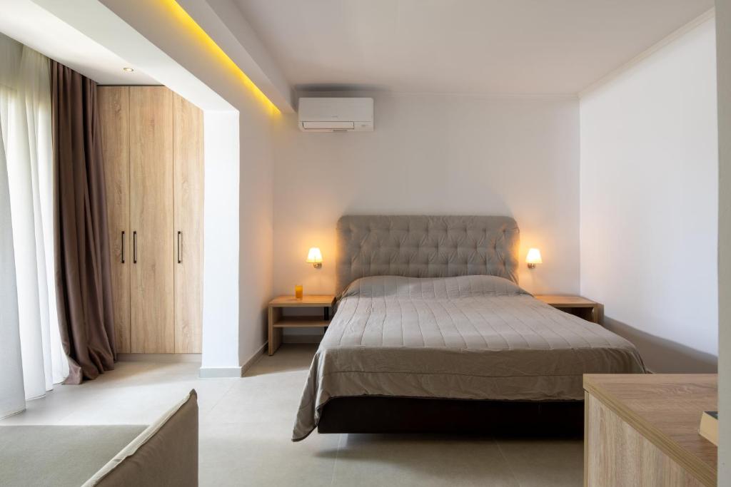 Postel nebo postele na pokoji v ubytování Lagomandra Beach Hotel
